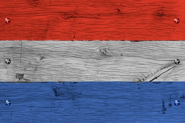 The Netherlands national flag painted old oak wood fastened — Stock Photo, Image