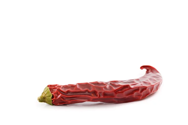 Dried red hot chili pepper white surface — Stock Photo, Image