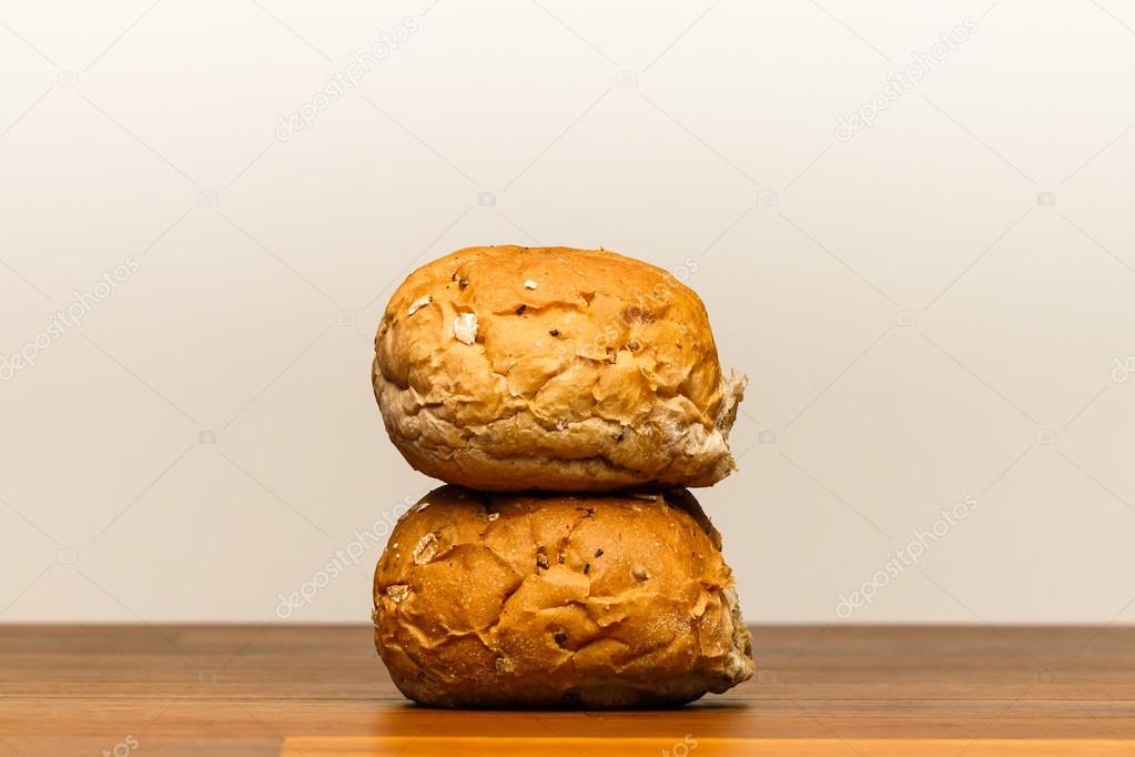 Two spelt buns stacked