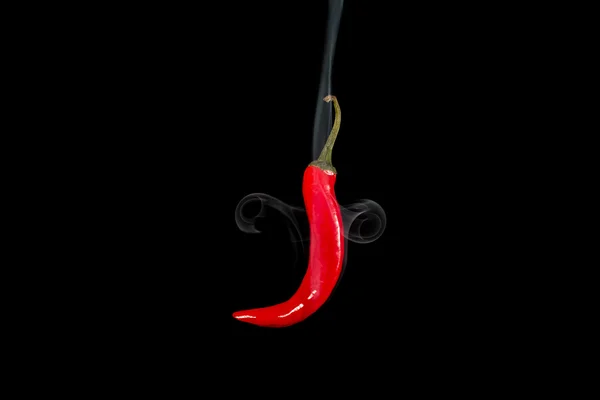 Smoking red hot chili pepper studio side — Stock Photo, Image