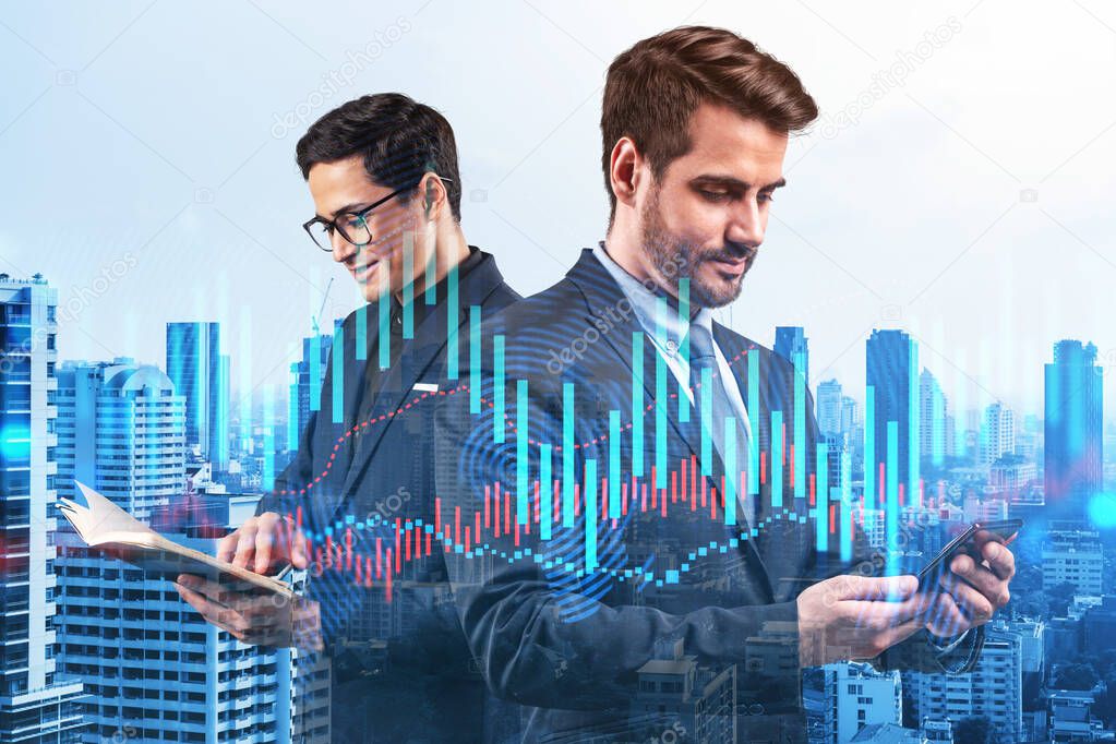 Two young handsome businessman in suits working on forecasting trading corporate strategy at fund. Forex chart. Bangkok on background. Double exposure.