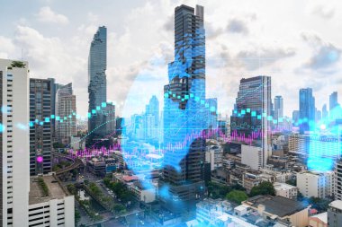 Asya 'daki finans merkezi Bangkok' un Panorama şehri manzarası üzerinde eski ve borsa hologramı. Uluslararası ticaret kavramı. Çift pozlama.