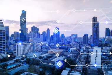 Parlak teknolojik süreç hologramı, gün batımında Bangkok 'un havadan panoramik manzarası. Asya 'daki en büyük yenilikçi teknoloji merkezi. Çoklu pozlama.