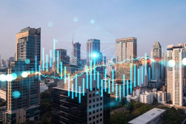 Işık saçan FOREX grafik hologramı, gün batımında Bangkok 'un panoramik şehir manzarası. Asya 'da hisse ve tahvil ticareti. Fon yönetimi kavramı. Çift pozlama.