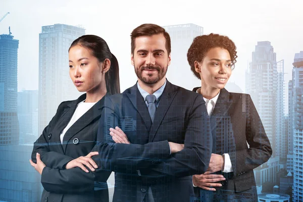 Front view of three successful smiling business consultants standing in a row in suits and crossed arms pose. Bangkok cityscape. Multinational corporate team. Double exposure.