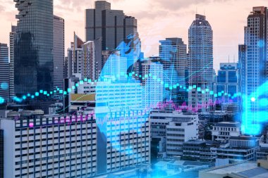 Işık saçan FOREX grafik hologramı, gün batımında Bangkok 'un panoramik şehir manzarası. Asya 'da hisse ve tahvil ticareti. Fon yönetimi kavramı. Çift pozlama.