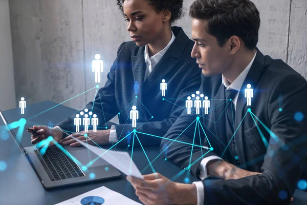 Two good looking businesspeople working on social network security project. Multiexposure. Hologram. — Stock Photo, Image