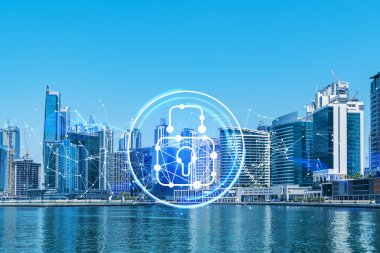 Şehir merkezindeki Dubai gökdelenleri. Uluslararası ticaret ve finansal hizmetler merkezi. Simge hologramını kilitle, veri güvenliği kavramı. Çifte maruziyet. Dubai Kanalı Rıhtımı.