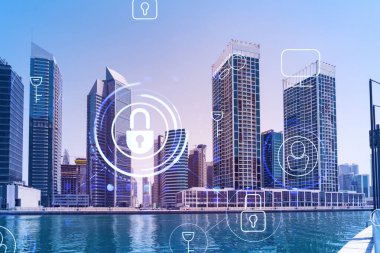 Şehir merkezindeki Dubai gökdelenleri. Uluslararası ticaret ve finansal hizmetler merkezi. Simge hologramını kilitle, veri güvenliği kavramı. Çifte maruziyet. Dubai Kanalı Rıhtımı.