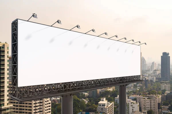 Blank white road billboard with Bangkok cityscape background at day time. Street advertising poster, mock up, 3D rendering. Side view. The concept of marketing communication to promote or sell idea. — Stock Photo, Image