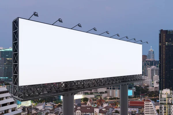 Blank white road billboard with Bangkok cityscape background at sunset. Street advertising poster, mock up, 3D rendering. Side view. The concept of marketing communication to promote or sell idea. — Stock Photo, Image