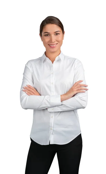 身穿白衬衫的女商人面带微笑地交叉在胸前，被白色的背景隔开了 — 图库照片