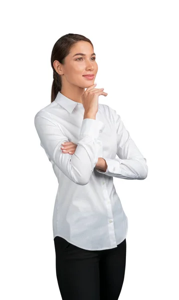 穿着白衬衫的女商人认为自己被隔离在白色背景之外 — 图库照片