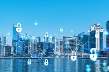 Şehir merkezindeki Dubai gökdelenleri. Uluslararası ticaret ve finansal hizmetler merkezi. Simge hologramını kilitle, veri güvenliği kavramı. Çifte maruziyet. Dubai Kanalı Rıhtımı.
