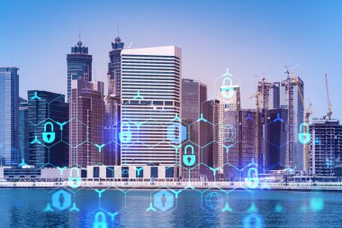 Şehir merkezindeki Dubai gökdelenleri. Uluslararası ticaret ve finansal hizmetler merkezi. Simge hologramını kilitle, veri güvenliği kavramı. Çifte maruziyet. Dubai Kanalı Rıhtımı.