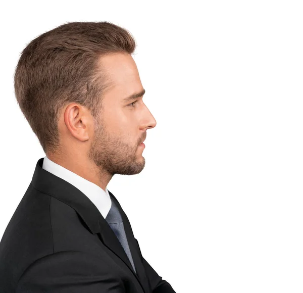 Geschäftsmann-Profil im schwarzen Anzug isoliert über weißem Hintergrund — Stockfoto