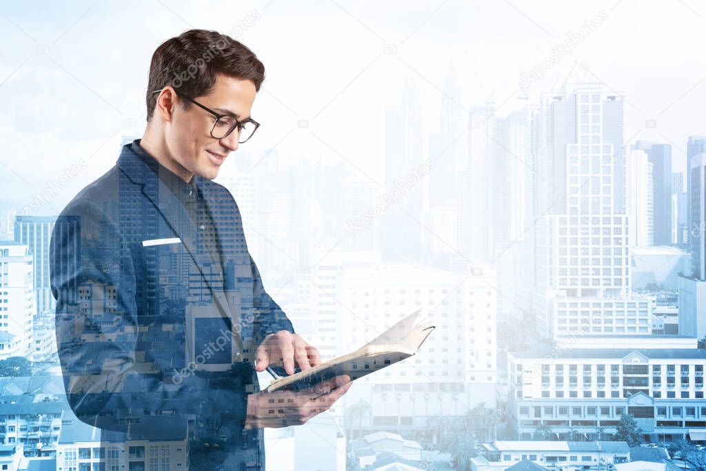 Young handsome businessman in suit and glasses thinking how to tackle the problem, new career opportunities, MBA assignment. Kuala Lumpur on background. Double exposure.