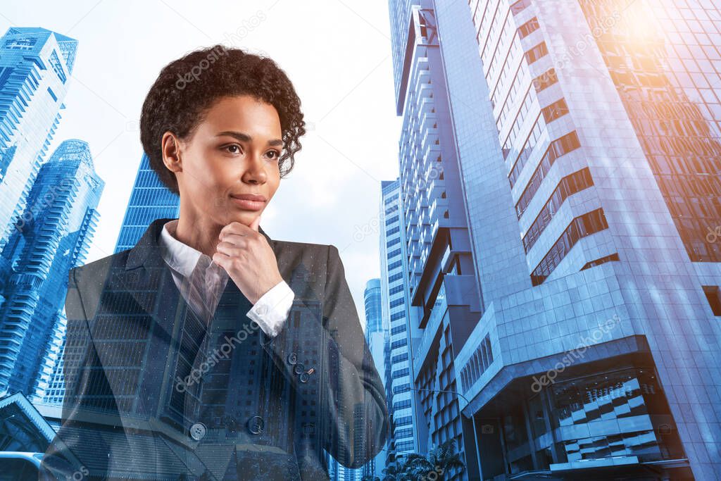 Attractive black African American business woman in suit with hand on chin thinking how to succeed, new career opportunities, MBA. Singapore on background. Double exposure.