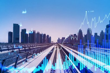 Modern fütürist trenle gökdelenlere giden yol. Teknik demiryolu Dubai 'nin şehir merkezindeki finans merkezine gidip gelenleri teslim ediyor. Uluslararası iş merkezi. Trafik konsepti. FOREX grafiği. Çift pozlama