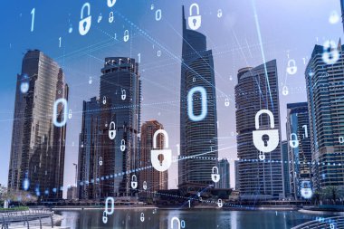 Şehir merkezindeki Dubai gökdelenleri. Uluslararası ticaret ve finansal hizmetler merkezi. Simge hologramını kilitle, veri güvenliği kavramı. Çifte maruziyet. Dubai Kanalı Rıhtımı.