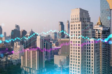 Işık saçan FOREX grafik hologramı, gün batımında Bangkok 'un panoramik şehir manzarası. Asya 'da hisse ve tahvil ticareti. Fon yönetimi kavramı. Çift pozlama.