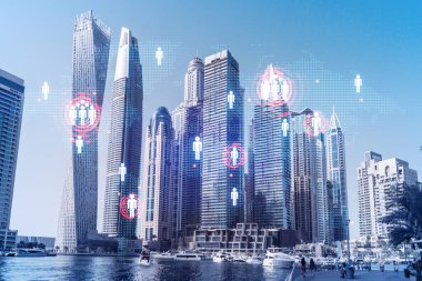 Şehir merkezindeki Dubai gökdelenleri. Uluslararası ticaret ve finansal hizmetler merkezi. Sosyal ağ simgeleri hologram, insanların bağlantı konsepti. Çifte maruziyet. Dubai Kanalı Rıhtımı.
