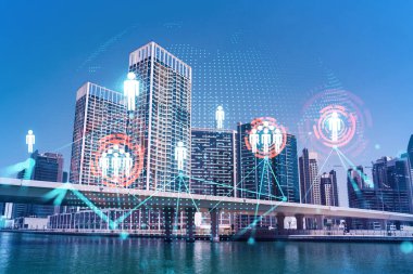 Şehir merkezindeki Dubai gökdelenleri. Uluslararası ticaret ve finansal hizmetler merkezi. Sosyal ağ simgeleri hologram, insanların bağlantı konsepti. Çifte maruziyet. Dubai Kanalı Rıhtımı.
