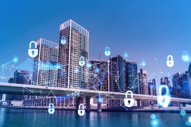 Şehir merkezindeki Dubai gökdelenleri. Uluslararası ticaret ve finansal hizmetler merkezi. Simge hologramını kilitle, veri güvenliği kavramı. Çifte maruziyet. Dubai Kanalı Rıhtımı.