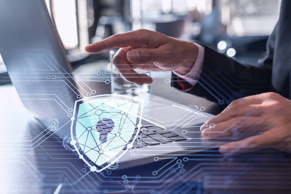 A programmer is typing a code on computer to protect a cyber security from hacker attacks and save clients confidential data. Padlock Hologram icons over the typing hands. Formal wear. — Stock Photo, Image