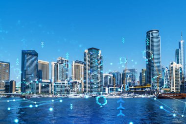 Şehir merkezindeki Dubai gökdelenleri. Uluslararası ticaret ve finansal hizmetler merkezi. Teknoloji teması hologramı simgeler, büyük veri kavramı. Çifte maruziyet. Dubai Kanalı Rıhtımı.