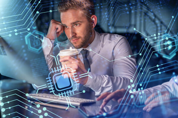 Two colleagues in formal wear working together to optimize business process by applying new technologies. Hi tech holograms over modern office background with panoramic windows