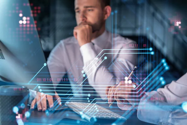 Two colleagues in formal wear working together to optimize business process by applying new technologies. Hi tech holograms over modern office background with panoramic windows — Stock Photo, Image