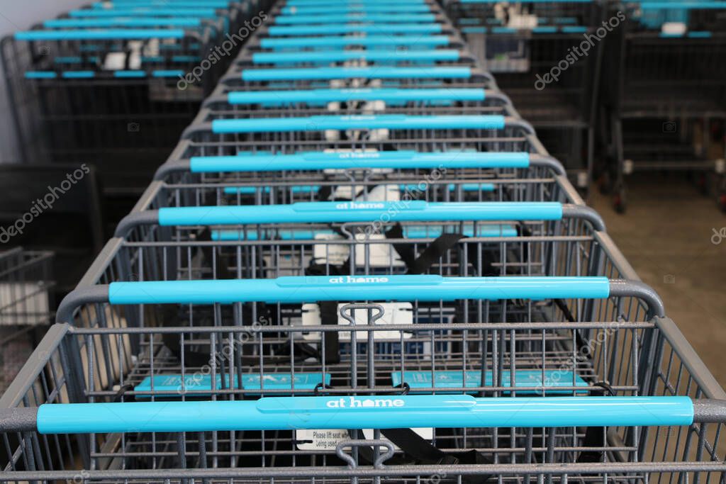 Columbus, Ohio May 28, 2020.  At Home is an American big box retail chain specializing in home decor items based in Plano, Texas. A row of shopping carts made available for customer convenience.