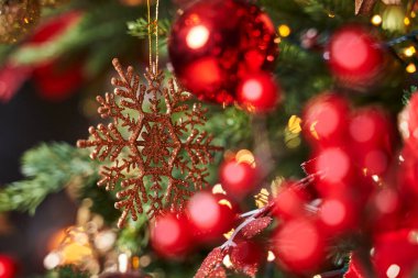 golden snowflake on christmas tree                                              