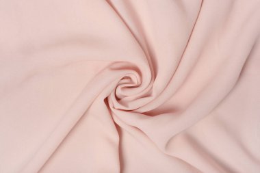 Pembe buruşuk ipek kumaş