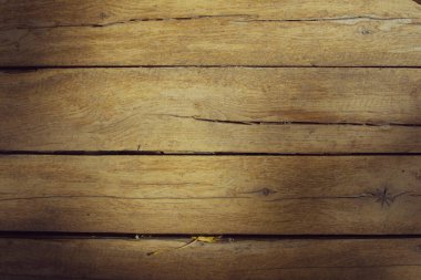 Güneş lekeli eski ahşap tahtaların dokusu. Yatay format. Tasarım için arka plan. Kopyalama alanı