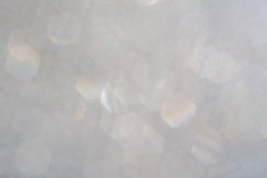 Güzel gümüş metin efektli Bokeh arkaplanı. Bulanık daireler, uzay sanatı ile renkli desenler. Kopyalama alanı