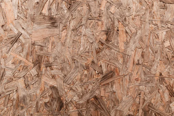 Pressed wood panel background, OSB oriented particle board texture