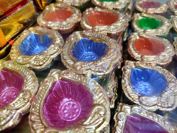 Colourful beautiful Earthen decorative diya or deepak packed for sale. — Stock Photo, Image