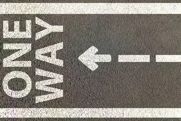 one way traffic allowed only , single lane road with painted arrows in one direction only