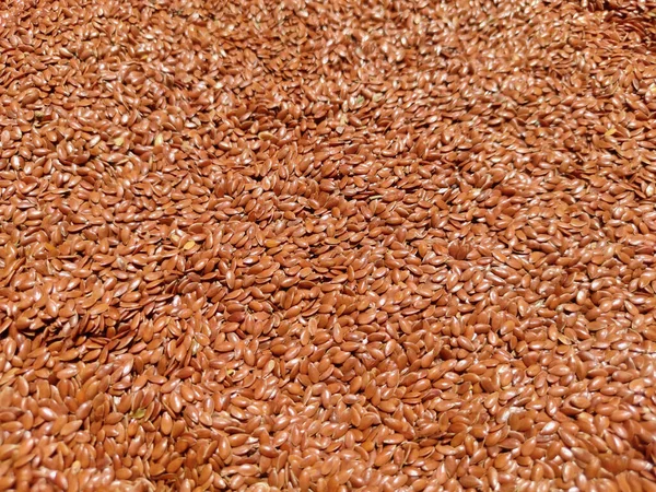 Graine de lin fond de couleur marron utilisé pour la santé et l'alimentation concept nutritionnel — Photo