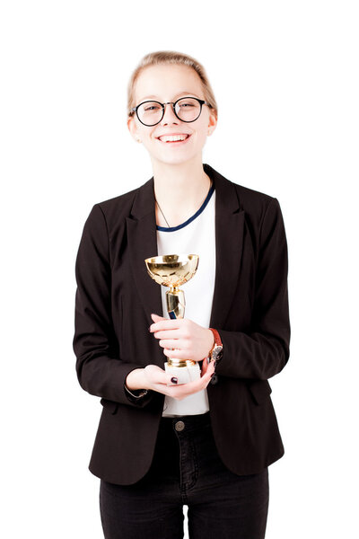 Beautiful girl hold cup as winner of competition isolated