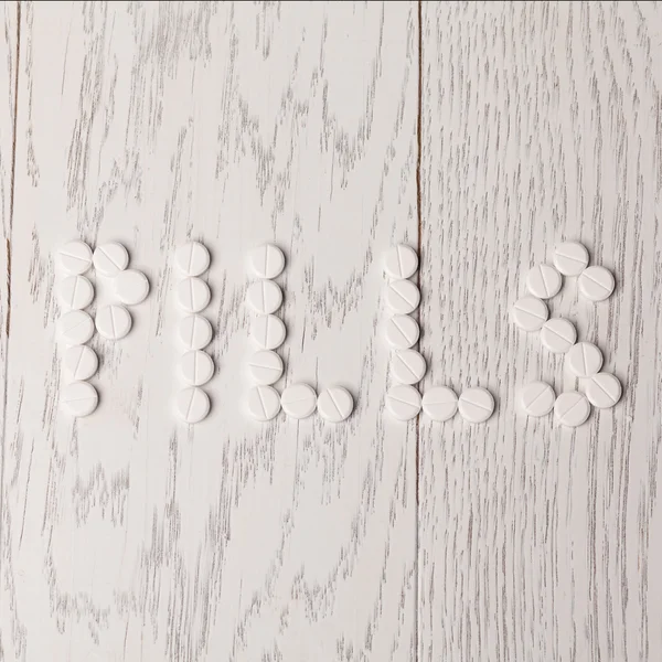 Word pills of tablets — Stock Photo, Image