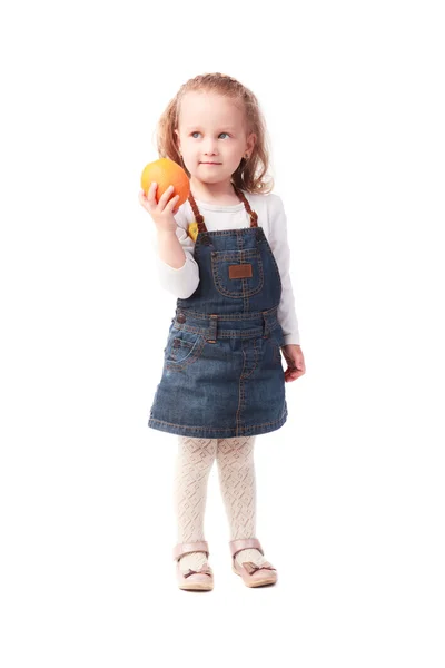 Pretty little girl holding an orange isolated on white — Stock Photo, Image