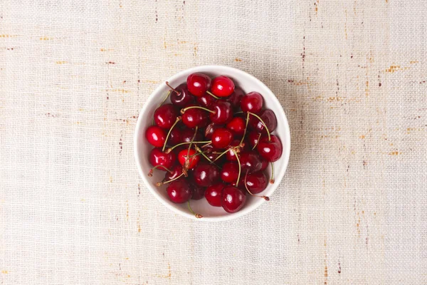 Fresh red cherries in bowl — Stock Photo, Image