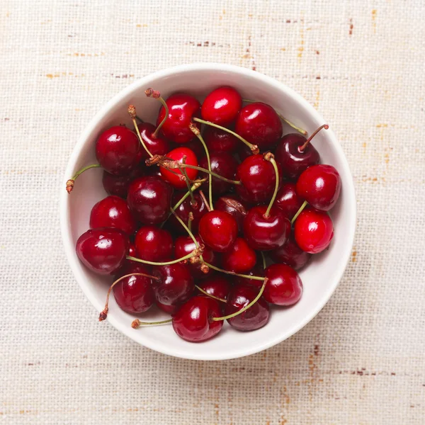 Fresh red cherries in bowl — Stock Photo, Image