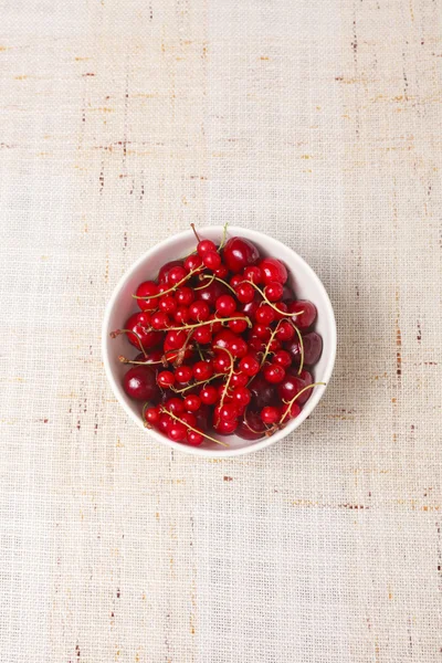 Mixed red berries in bowl — Stock Photo, Image