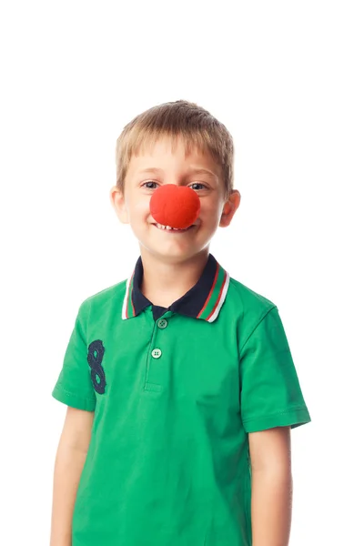 Ragazzino con naso da clown isolato su bianco — Foto Stock