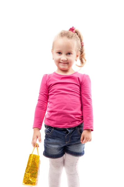 Little girl with shopping bag isolated on white — Stock Photo, Image