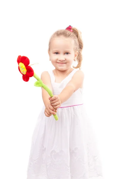 Linda niña con flor de juguete aislada —  Fotos de Stock